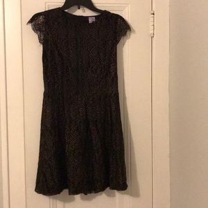 Short black dress with gold lace overlay